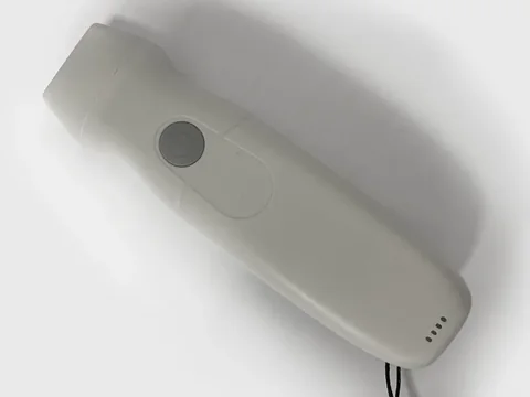 5PA机身俯拍特写,米色壳体配圆形按键与挂绳孔