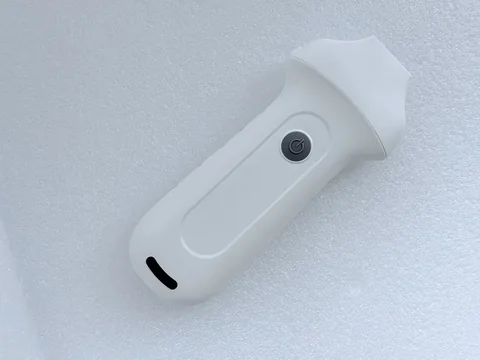 7H机身俯拍特写,电源按键与电量指示灯